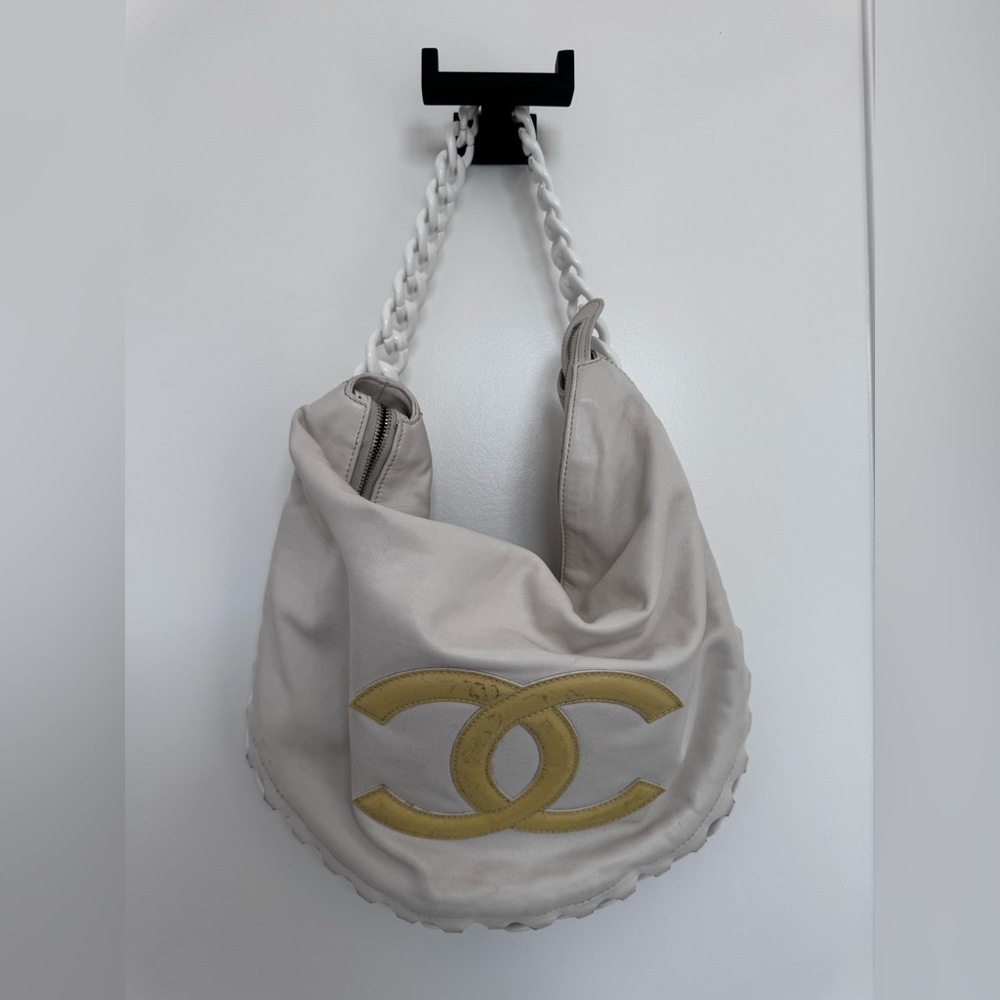 Chanel hobo bag with resin chain and patent leather CC logo